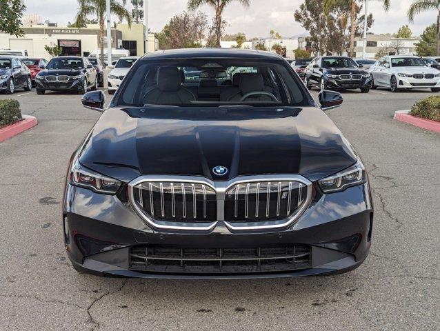 used 2024 BMW i5 car, priced at $65,295