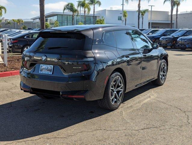 new 2025 BMW iX car, priced at $101,225