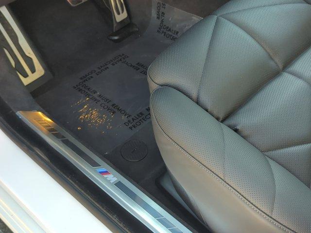 used 2024 BMW 740 car, priced at $75,754