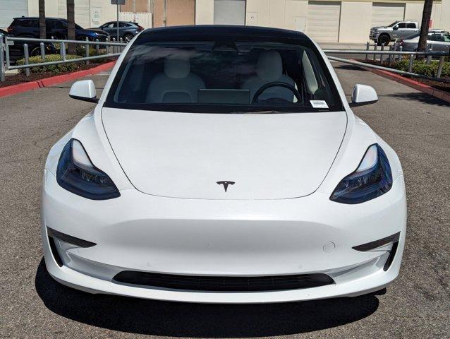 used 2022 Tesla Model 3 car, priced at $26,752