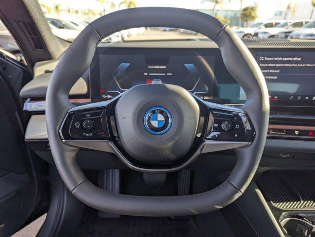 used 2024 BMW i5 car, priced at $59,900