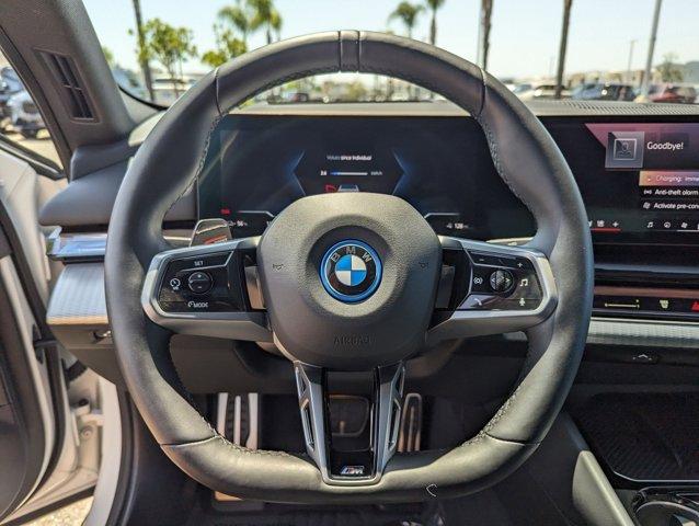 used 2024 BMW i5 car, priced at $49,852