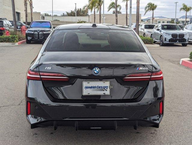 used 2024 BMW i5 car, priced at $63,587