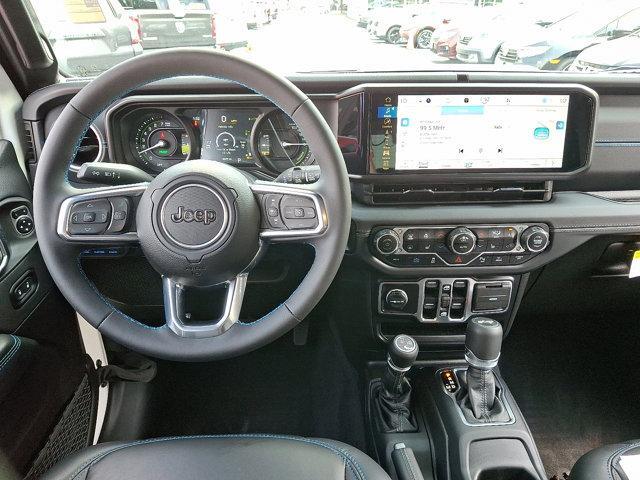 used 2024 Jeep Wrangler 4xe car, priced at $47,633