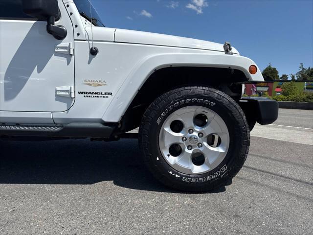 used 2014 Jeep Wrangler Unlimited car, priced at $17,991