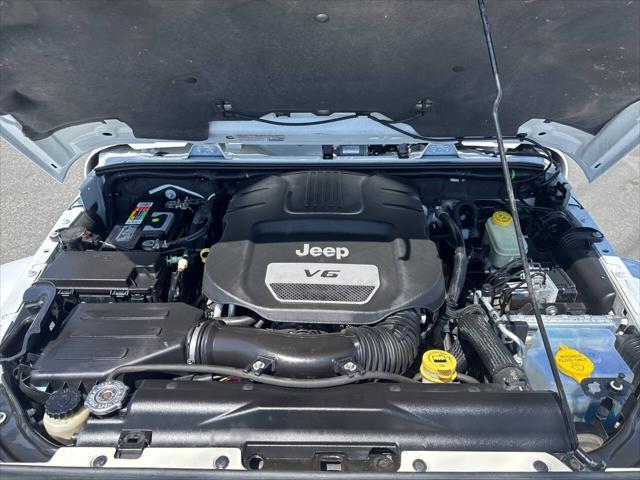 used 2014 Jeep Wrangler Unlimited car, priced at $17,991