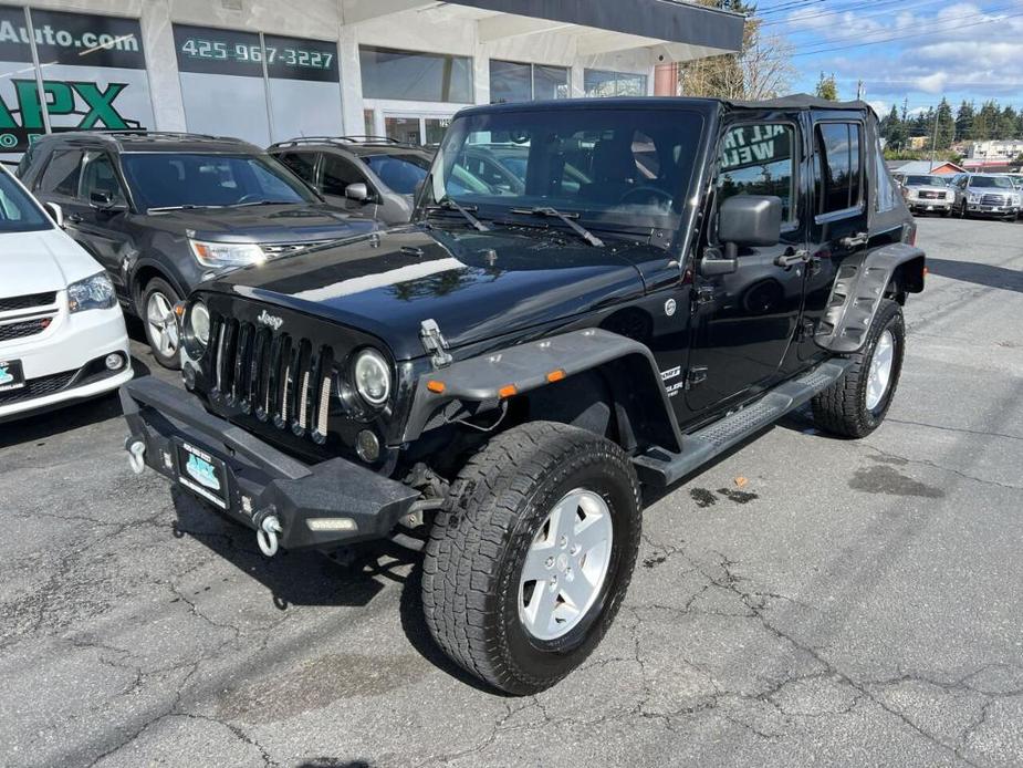 used 2011 Jeep Wrangler Unlimited car, priced at $13,991