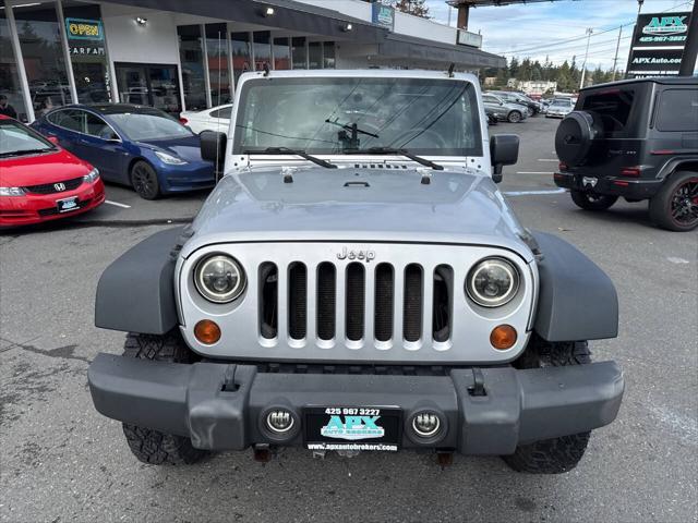 used 2010 Jeep Wrangler Unlimited car, priced at $11,991