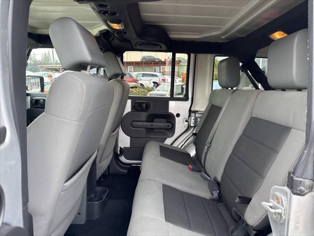 used 2010 Jeep Wrangler Unlimited car, priced at $11,991