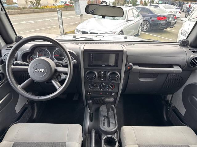 used 2010 Jeep Wrangler Unlimited car, priced at $11,991