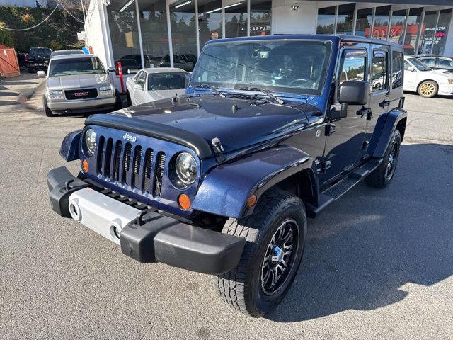 used 2013 Jeep Wrangler Unlimited car, priced at $16,991