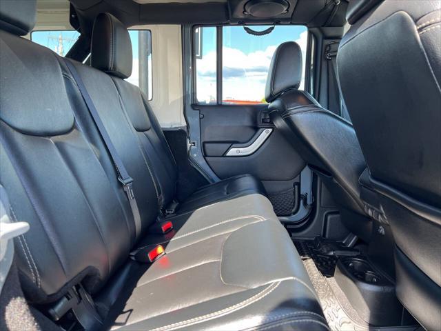 used 2014 Jeep Wrangler Unlimited car, priced at $25,991