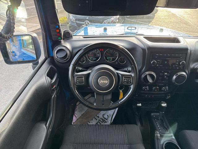 used 2011 Jeep Wrangler Unlimited car, priced at $10,991