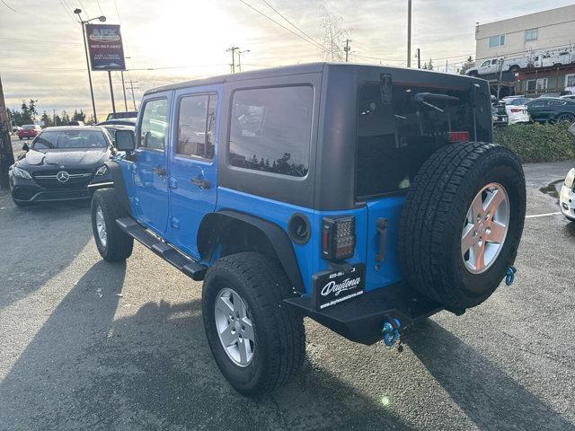 used 2011 Jeep Wrangler Unlimited car, priced at $10,991