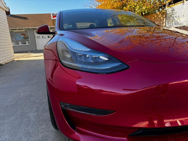 used 2023 Tesla Model 3 car, priced at $37,995