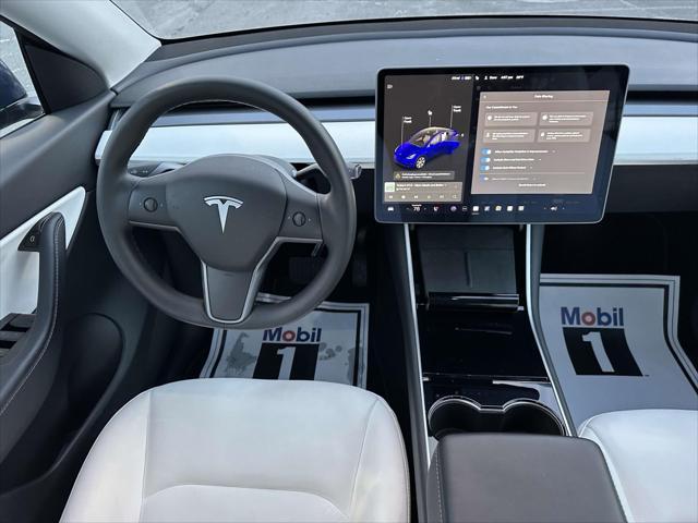 used 2021 Tesla Model Y car, priced at $28,395