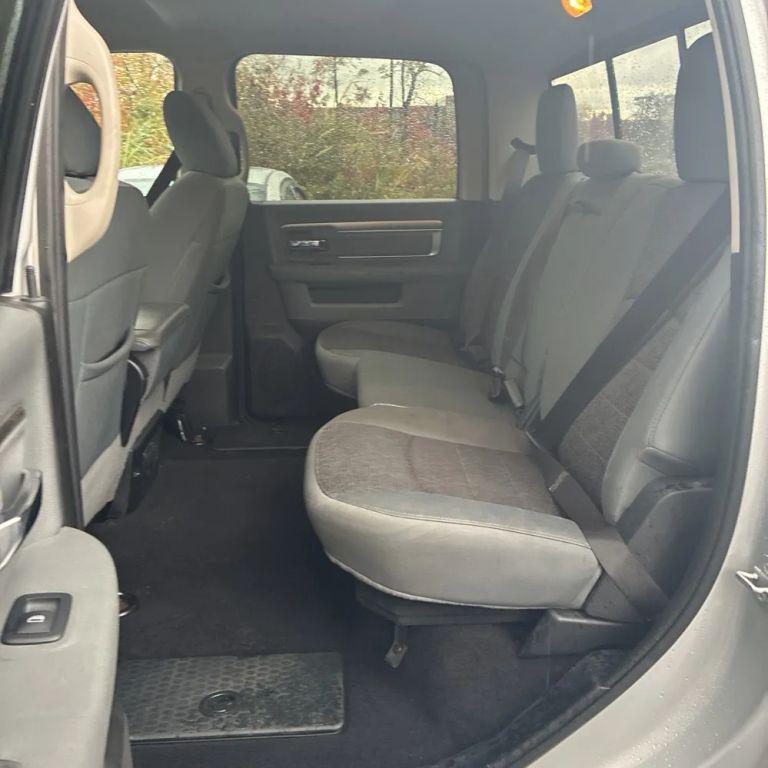 used 2018 Ram 1500 car, priced at $17,999