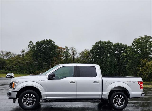 used 2018 Ford F-150 car, priced at $17,999