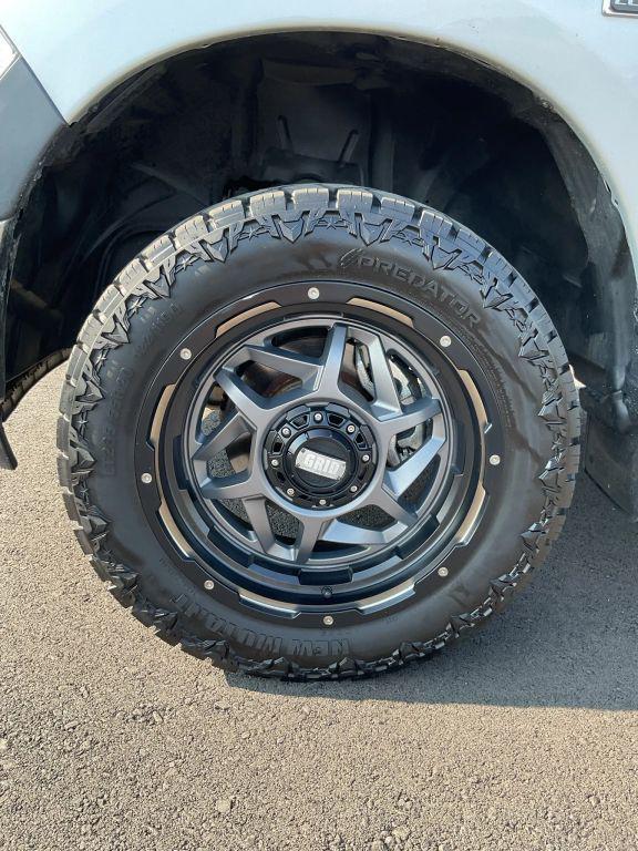 used 2018 Ram 1500 car, priced at $13,999