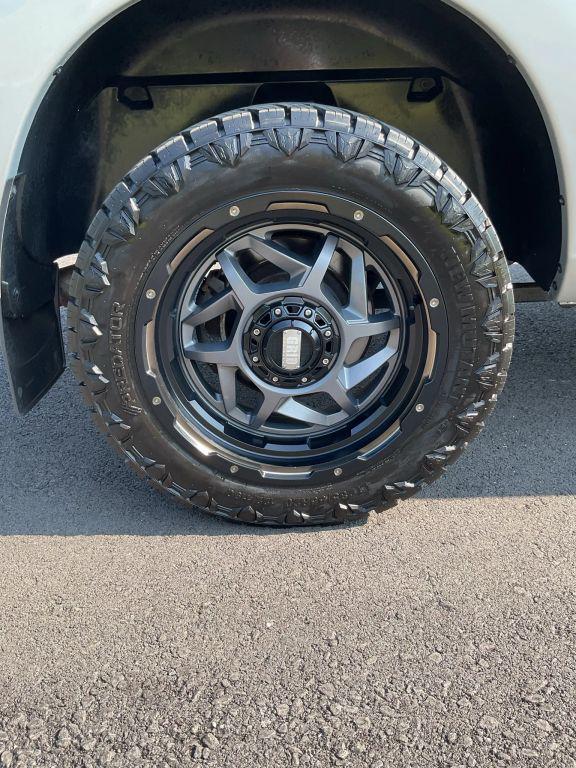 used 2018 Ram 1500 car, priced at $13,999