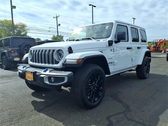 used 2024 Jeep Wrangler 4xe car, priced at $34,346