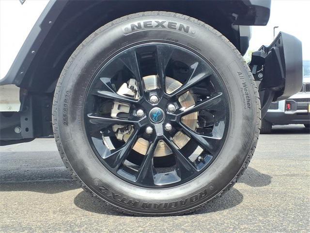 used 2024 Jeep Wrangler 4xe car, priced at $34,346