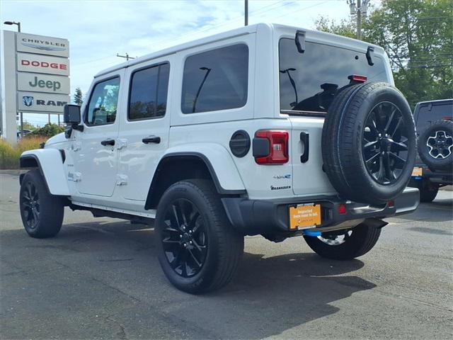 used 2024 Jeep Wrangler 4xe car, priced at $34,346