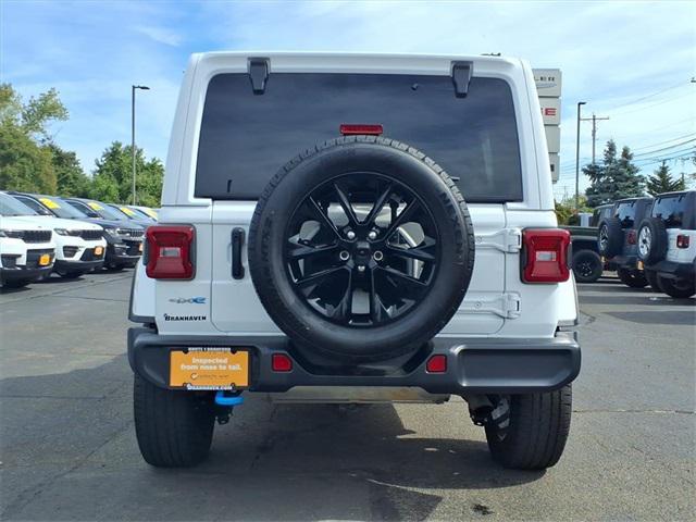 used 2024 Jeep Wrangler 4xe car, priced at $34,346