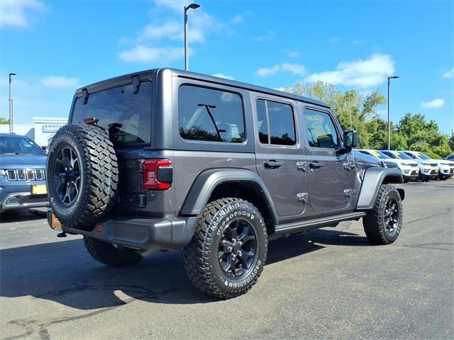 used 2021 Jeep Wrangler car, priced at $34,452