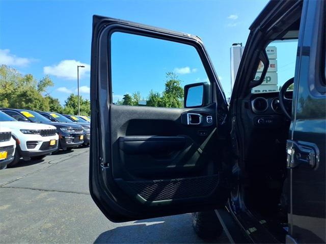 used 2021 Jeep Wrangler car, priced at $34,452
