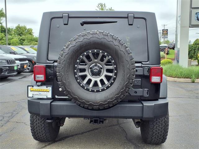 used 2011 Jeep Wrangler Unlimited car, priced at $15,596
