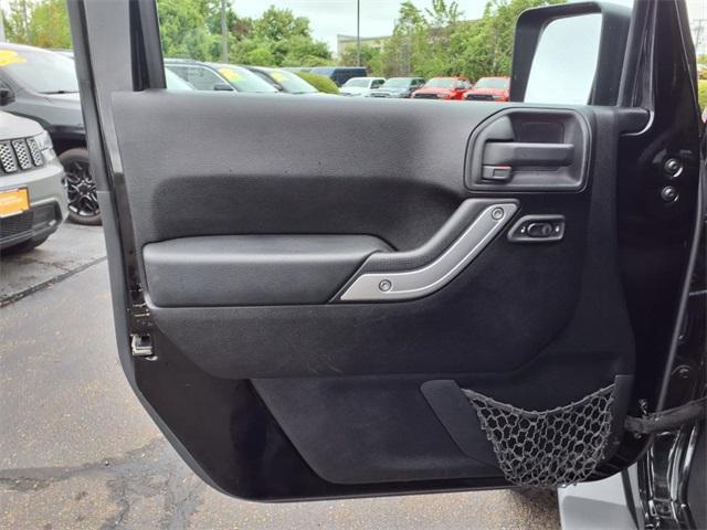 used 2011 Jeep Wrangler Unlimited car, priced at $15,596