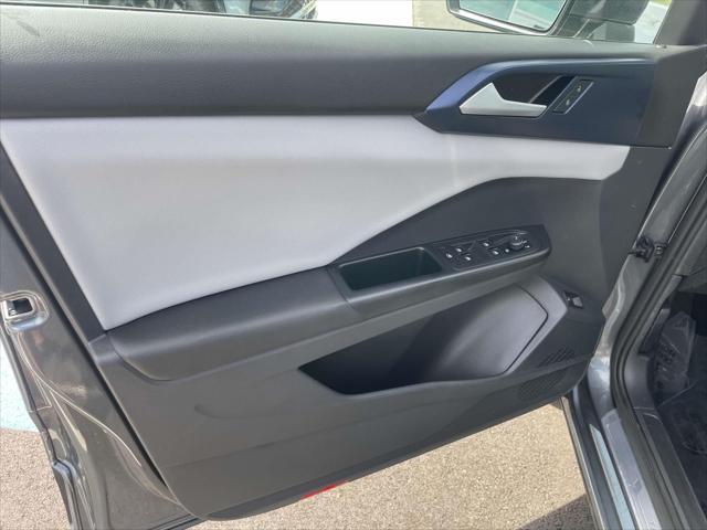 used 2023 Volkswagen Taos car, priced at $23,289