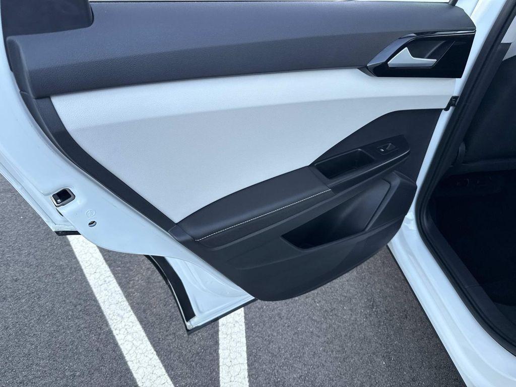 used 2025 Volkswagen Taos car, priced at $23,595