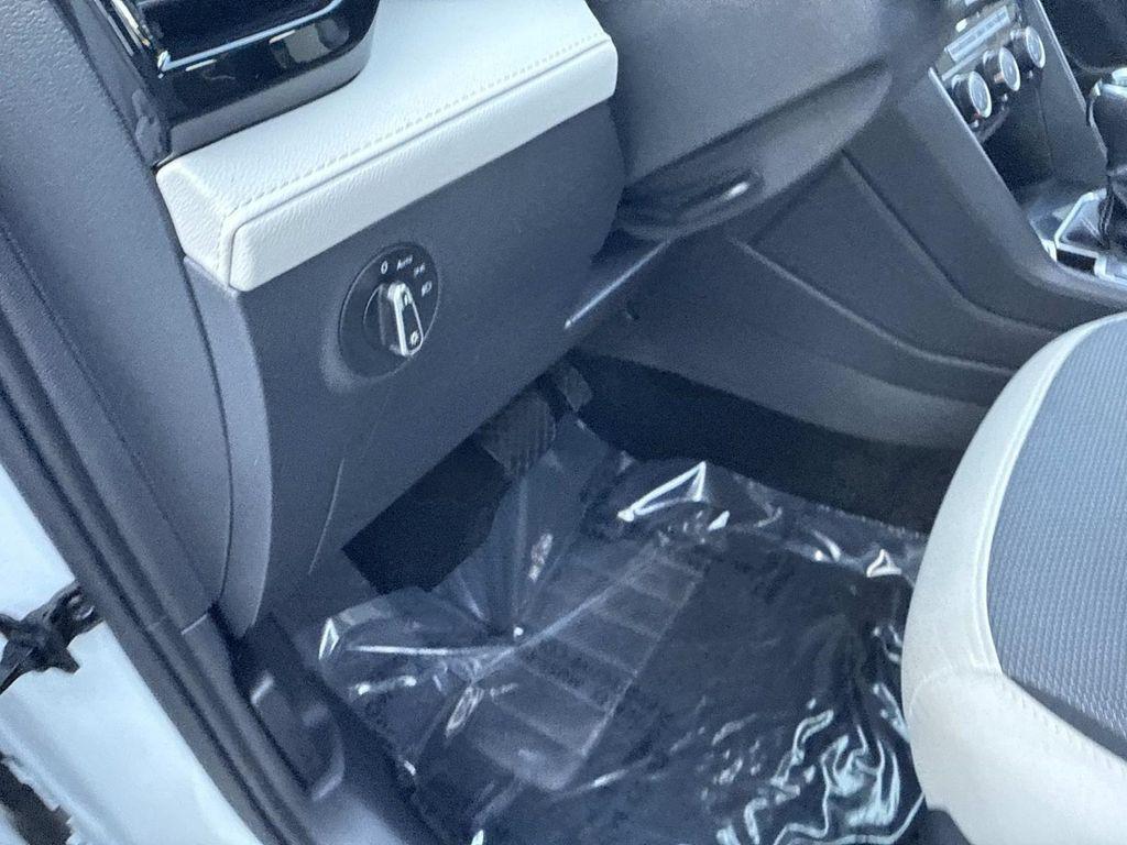 used 2025 Volkswagen Taos car, priced at $23,595