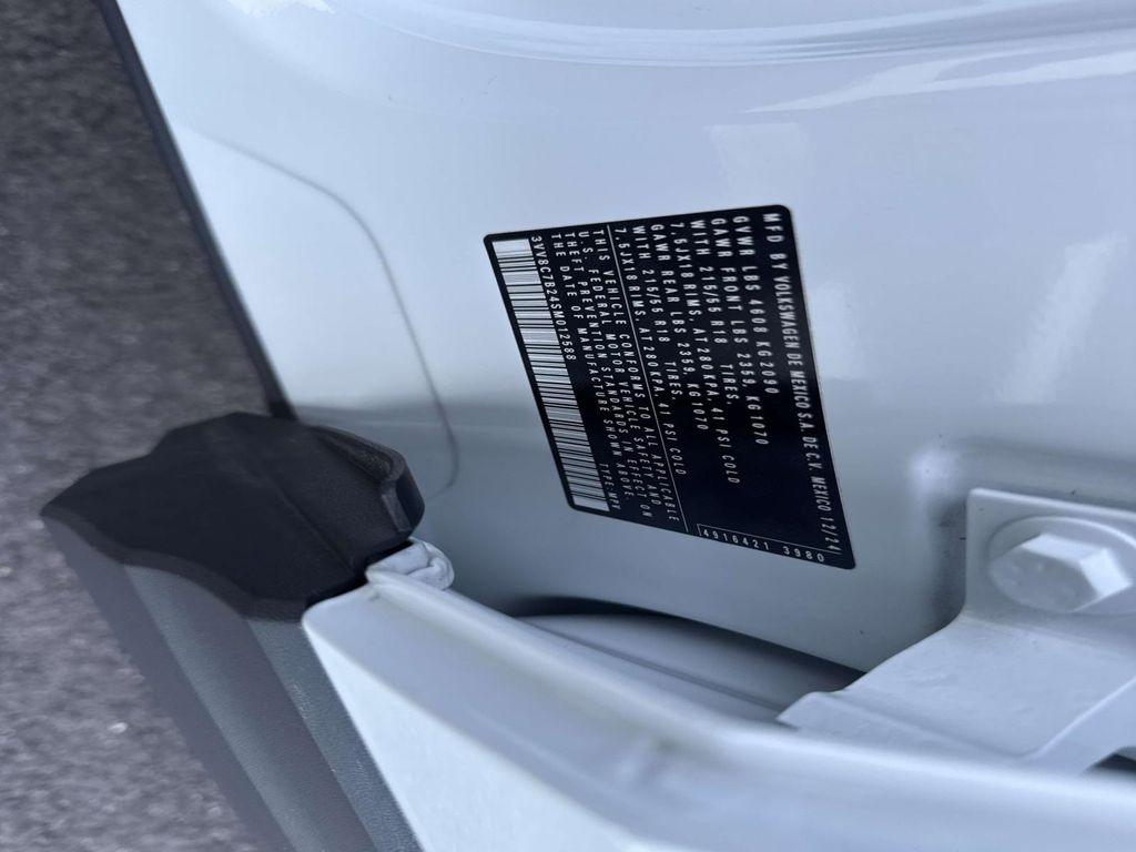 used 2025 Volkswagen Taos car, priced at $23,595