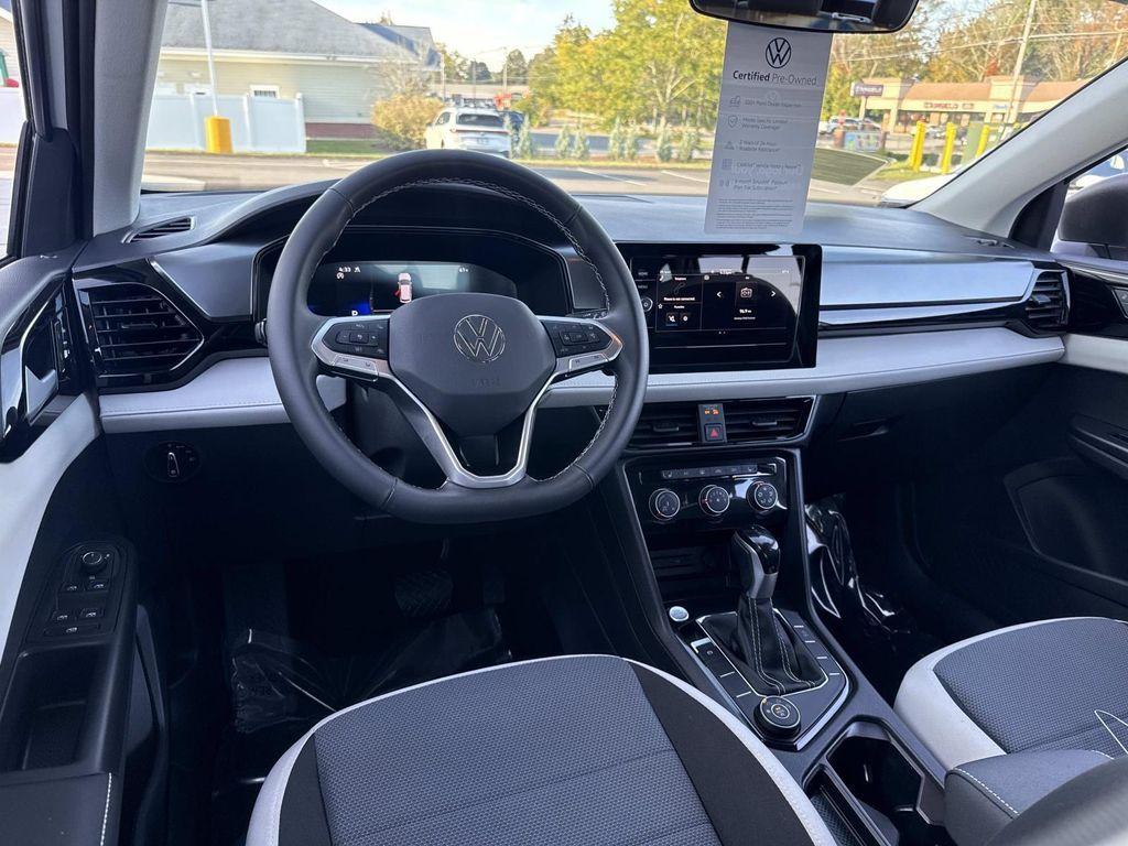 used 2025 Volkswagen Taos car, priced at $23,595