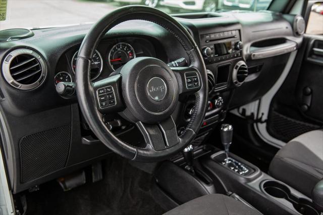 used 2015 Jeep Wrangler Unlimited car, priced at $20,950