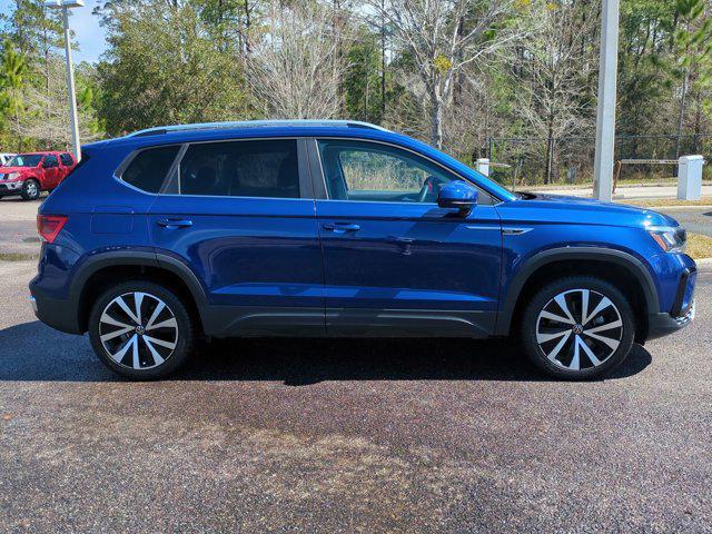 used 2023 Volkswagen Taos car, priced at $23,877