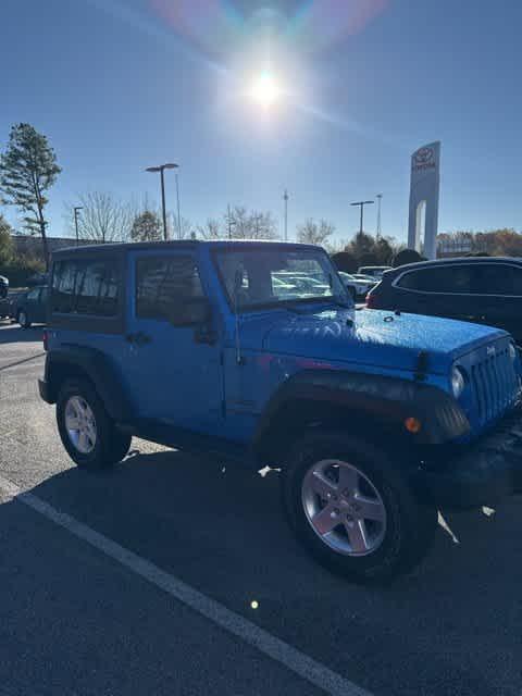 used 2015 Jeep Wrangler car, priced at $17,271