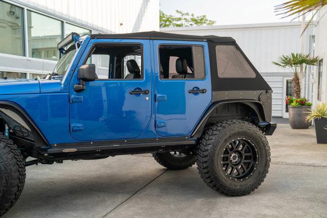 used 2014 Jeep Wrangler Unlimited car, priced at $39,950