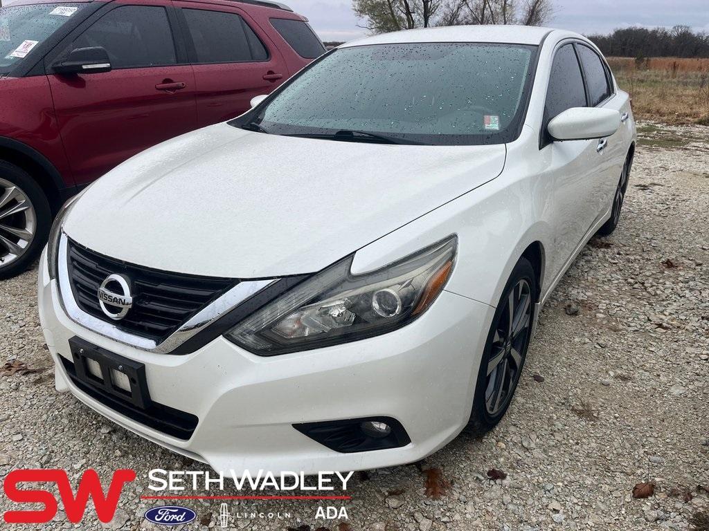 used 2016 Nissan Altima car, priced at $9,999