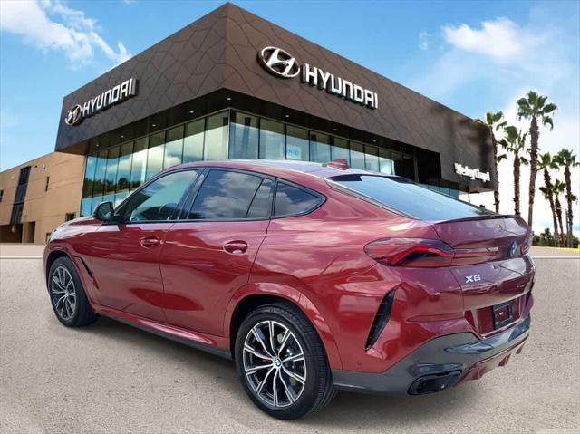 used 2022 BMW X6 car, priced at $53,726