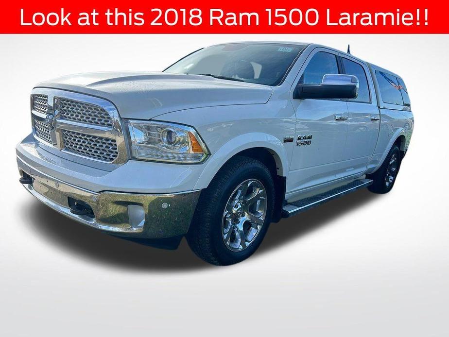 used 2018 Ram 1500 car, priced at $24,297