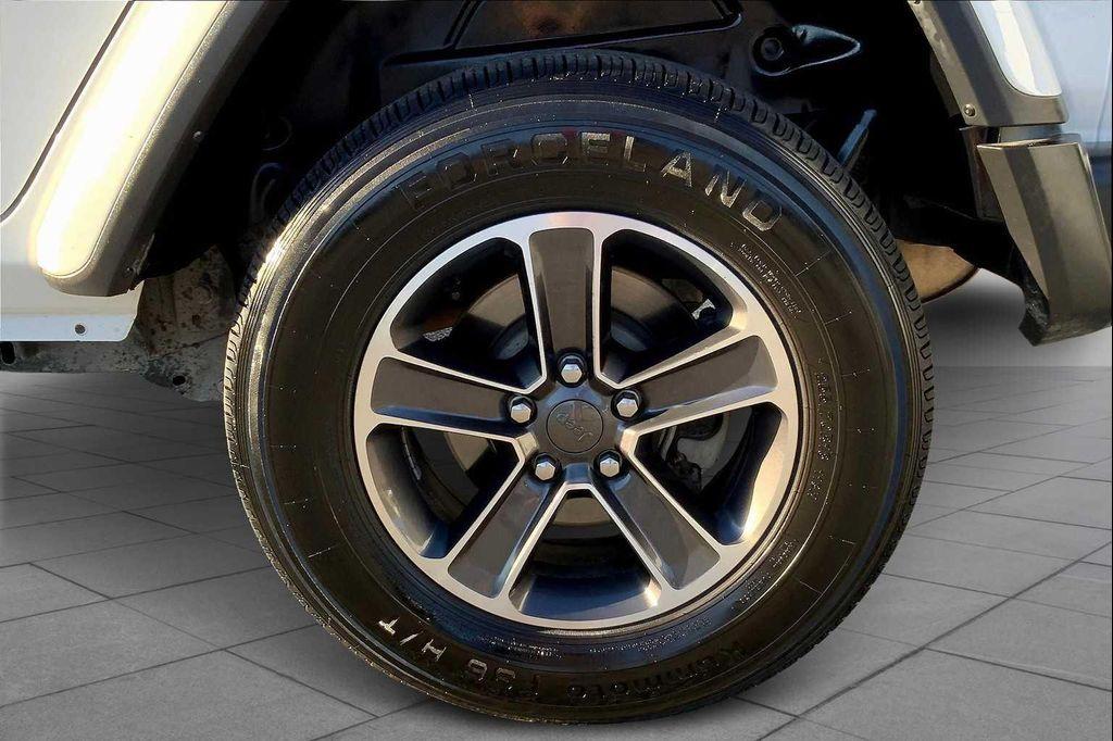 used 2023 Jeep Wrangler car, priced at $28,497