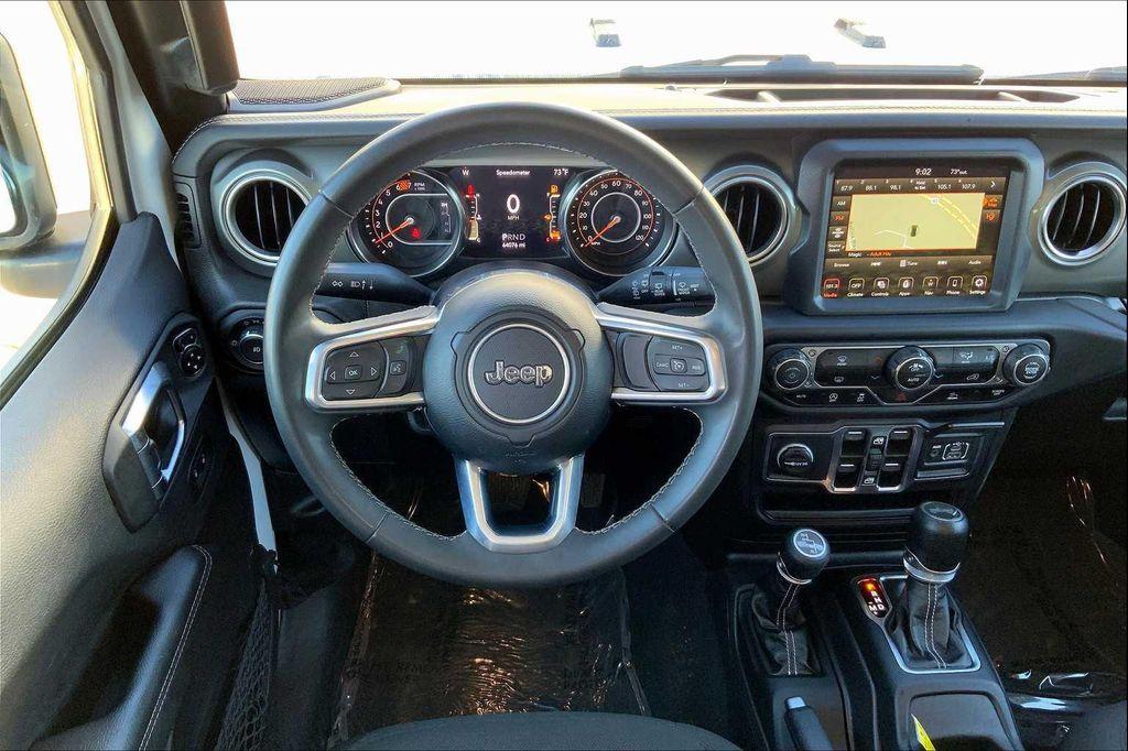 used 2023 Jeep Wrangler car, priced at $28,497