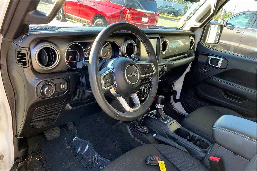 used 2023 Jeep Wrangler car, priced at $28,497
