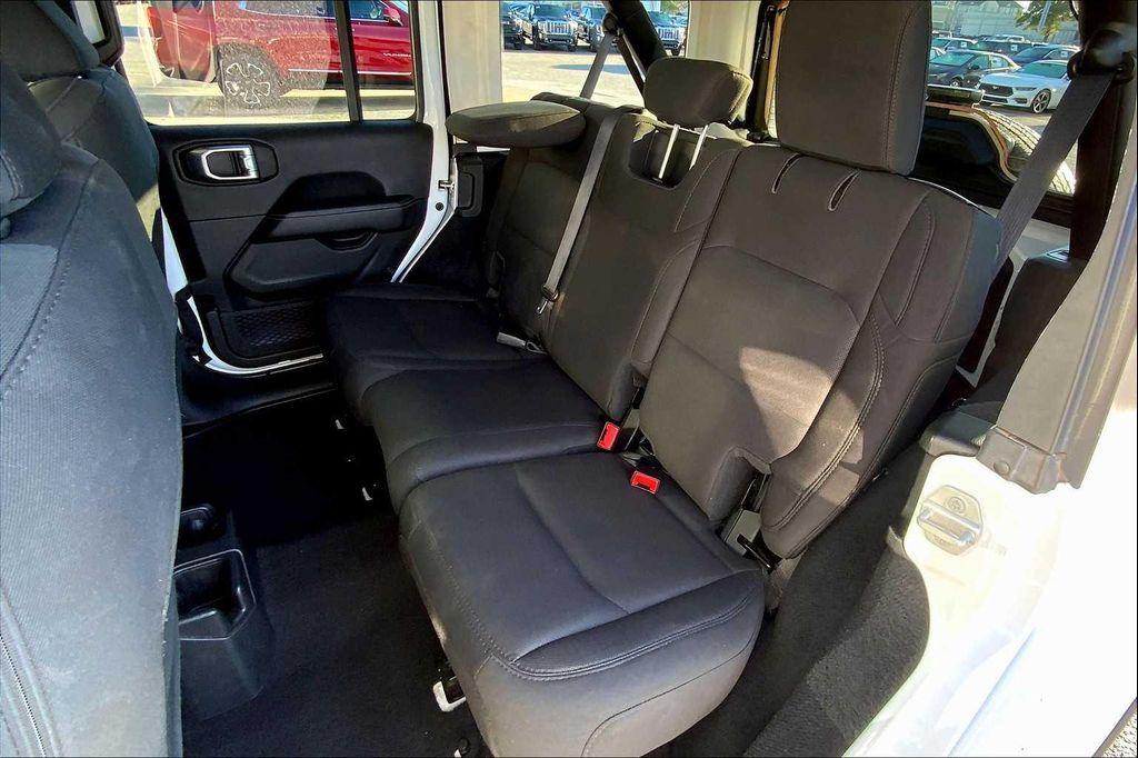 used 2023 Jeep Wrangler car, priced at $28,497