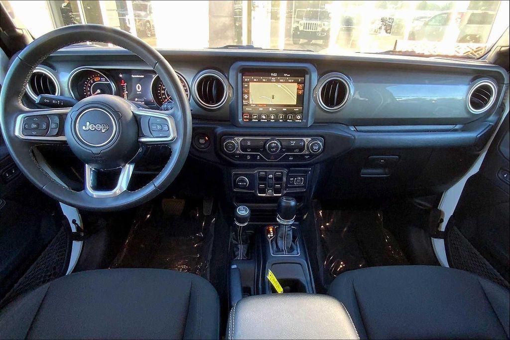 used 2023 Jeep Wrangler car, priced at $28,497