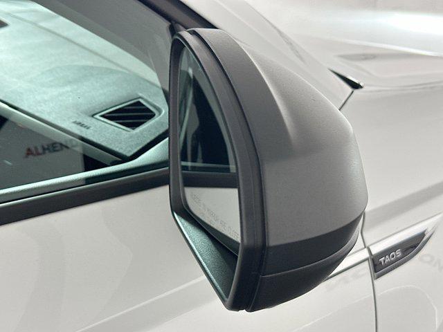 used 2024 Volkswagen Taos car, priced at $17,499